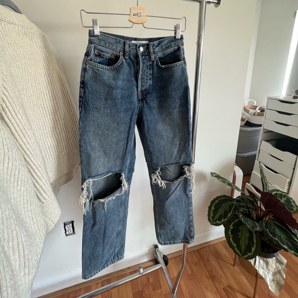 Dark blue baggy ripped jeans